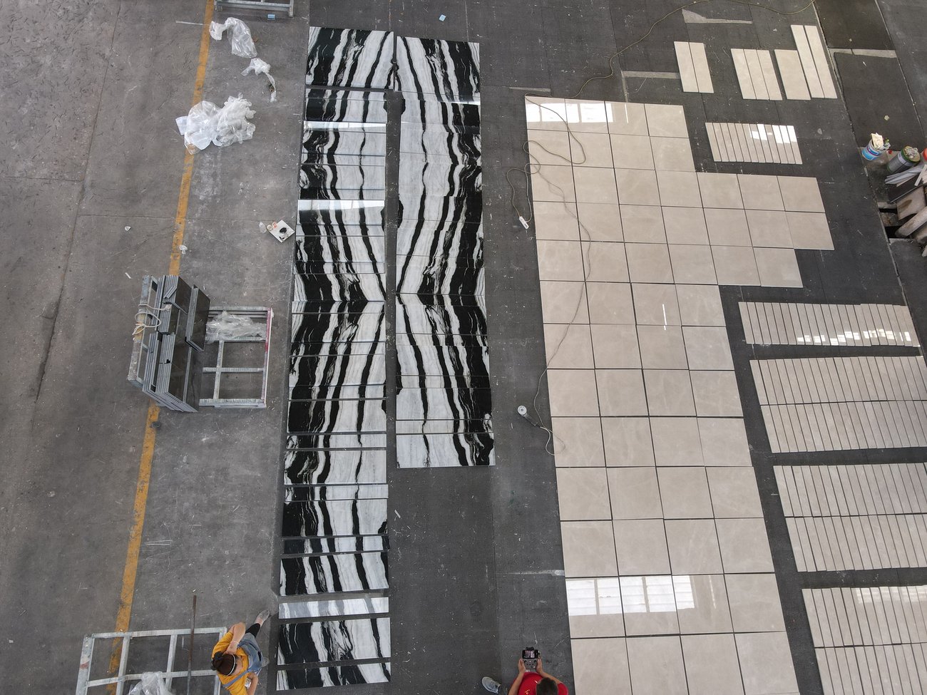 Panda White marble and beige marble dry-laid on the factory floor for vein matching